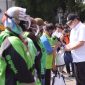 Menko Perekonomian Airlangga Hartarto dalam acara pembagian bantuan sosial untuk pengemudi ojek online yang diselenggarakan oleh Kementerian Perhubungan pada Minggu, 25 Juli 2021 di Kota Bogor.(Foto:pelopor.id/Kemenko Perekonomian)