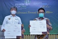 KemenkopUKM dan Bank DKI melakukan penandatanganan perjanjian kerjasama pembiayaan dalam rangka pembiayaan subsidi bunga/subsidi marjin KUR. (Foto:Pelopor.id/KemenkopUKM)