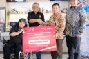 Dokumentasi penyaluran dana bantuan Bank Jakarta ke sahabat disabilitas binaan YaSDI. (Foto: Istimewa)