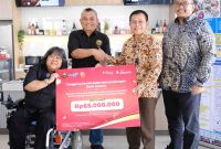 Dokumentasi penyaluran dana bantuan Bank Jakarta ke sahabat disabilitas binaan YaSDI. (Foto: Istimewa)